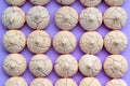 Top view on meringues in line on colored background