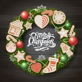 Top view of Merry Christmas concept design. Christmas wreath with cookies on wooden background. Royalty Free Stock Photo