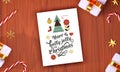 Top View Of Merry Christmas Greeting Card With 3D Gift Boxes, Candy Canes, Golden Stars And Snowflakes On Brown Wooden Royalty Free Stock Photo