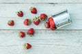 Top view of metal bowl full of freshly picked ripe red strawberries on the rustic wooden background. Flat lay. Fresh organic food Royalty Free Stock Photo