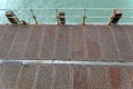 Top view of metal walkway on Seaside pier in Bournemouth UK.