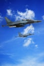 Top view of Military jet plane flying over sky Royalty Free Stock Photo