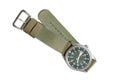 Top view military wrist watch with green nylon strap on white background Royalty Free Stock Photo