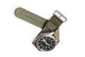 Top view military wrist watch with green nylon strap on white background Royalty Free Stock Photo