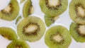 TOP VIEW: Milk fills a kiwi slices