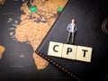 Top view miniature people and toys word with text CPT Royalty Free Stock Photo