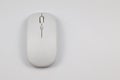 Top view of a minimalist white wireless optical computer mouse Royalty Free Stock Photo