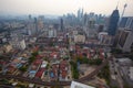 Top view of misty Kuala Lumpur city skyline with Petronas twin towers shot in the morning at sunrise Royalty Free Stock Photo