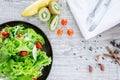 Top view mix fruit and vegetable ,Healthy eating mix of fresh vegetables salad topped on wooden table Royalty Free Stock Photo