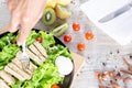 Top view mix fruit and vegetable ,Healthy eating mix of fresh vegetables salad topped on wooden table Royalty Free Stock Photo