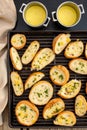 Top View of Mixed Grilled Breads with Garlic Butter Pots, Assorted Grilled Breads Including Ciabatta and More Royalty Free Stock Photo