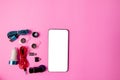 Top view mobile device with mobile blank space for text,.accessories. micro USB Adapter, macro lens on pink background Royalty Free Stock Photo