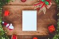 Top view mockup image of white blank notebook with christmas decorations Royalty Free Stock Photo