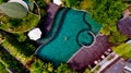 Top view of a model men in light green shorts is enjoying relax in pool. Royalty Free Stock Photo