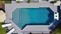 Top View of Modern Backyard Pool with Lounge Area â AI Generated Content Royalty Free Stock Photo