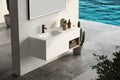 Top view of modern bathroom cabinet with white wall,