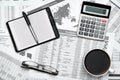 Top view of modern black office desk with notebook, pencil, financial statements and a lot of things. Flat lay table layout Royalty Free Stock Photo