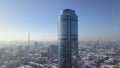Top view of the modern city in winter. Beautiful Sunny day in the big city with a skyscraper in the winter Royalty Free Stock Photo