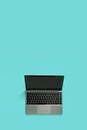 Top view of modern laptop isolated on blue background. Copy space Royalty Free Stock Photo