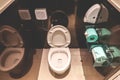 Top View Of Modern Toilet Bowl, And Toilet Paper In The Black Room is public restroom Royalty Free Stock Photo