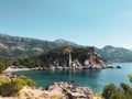 Top view Montenegro Sutomore stones beach blue turquoise Adriatic sea water mountains day Royalty Free Stock Photo