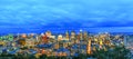 Top view of the Montreal city at sunrise or sunset, with illuminated buildings. Beautiful downtown skyscrapers and city skyline at