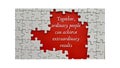 Top view of motivational quote on red cover - Together, ordinary people can achieve extraordinary results.With jigsaw Royalty Free Stock Photo