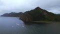 Top view of mountain coast with rocks on cloudy day. Clip. Beautiful landscape of sea and mountain island in cloudy Royalty Free Stock Photo