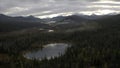 Top view of mountain landscape with forest and lakes in autumn. Clip. Landscape with forest mountains and lakes with Royalty Free Stock Photo