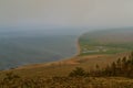 top view from the mountain shore of lake Baikal in fog, smoke, after fire Royalty Free Stock Photo