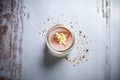 top view of mousse in glass, cocoa dusting on top