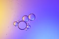 Top view movement of oil bubbles in the liquid Royalty Free Stock Photo