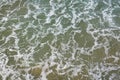 Top view on moving sea water with waves and foam, texture background pattern Royalty Free Stock Photo