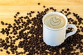 Top view of a mug of coffee with beans. Royalty Free Stock Photo