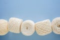 Top view of multi-colored woolen balls of yarn in a row Royalty Free Stock Photo