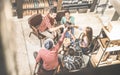 Top view of multi racial friends tasting red wine and having fun Royalty Free Stock Photo