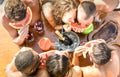 Top view of multiracial friend having fun at sail boat party Royalty Free Stock Photo