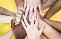 Top view of multiracial stacking hands - International friendship