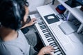 Top view of musician Playing Electric Piano at home recording studio Royalty Free Stock Photo
