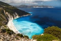 A top view at Myrtos Beach and fantastic turquoise and blue Ionian Sea water. Aerial view, summer scenery of famous and Royalty Free Stock Photo