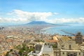 Top view on Naples city in Italy back-grounded by volcano Vesuvius taken from fort Sant Elmo in Campania. Royalty Free Stock Photo