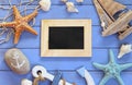 Top view of nautical concept with blank chalkboard next to nautical life style objects Royalty Free Stock Photo