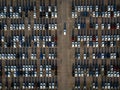 Top view of new cars in a parking lot ready for export or import Royalty Free Stock Photo