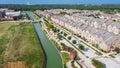 Top view new development riverside residential and commercial neighborhood with vacant land in Texas, USA Royalty Free Stock Photo