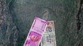 A top view of the new Rs 2000 currency bill along with a Rs 100 bill. The new currency bill was introduced after demonetization of