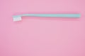 Top view of a new toothbrush isolated on a pink background Royalty Free Stock Photo