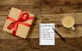 2019 New Year Resolutions written on notebook with Gift and coffee on wood table in Better life goals Royalty Free Stock Photo