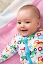 Top view of newborn baby boy lying on colorful blankets Royalty Free Stock Photo