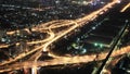 Top view on the night city and highways. Bangkok, Thailand