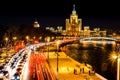 Top view of night wintry Moscow, house on the waterfront promenade, bridge and Moscow river, Russia Royalty Free Stock Photo